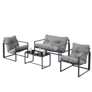 Outdoor patio furniture set with a gray cushioned sofa, two armchairs, and a matching glass-topped coffee table with drinks and snacks.