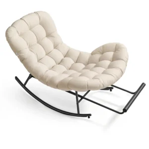 Beige tufted cushioned rocking chair with a black metal frame and curved rockers, designed for lounging.